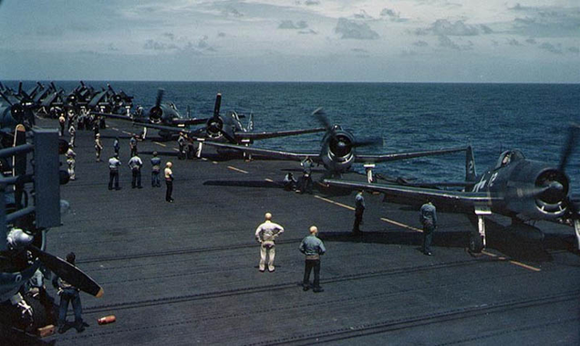 Hellcats on the deck of the light aircraft carrier USS Cowpens (CVL-25) prepare for a mission against the Marshall Islands in January 1944. (US Navy)